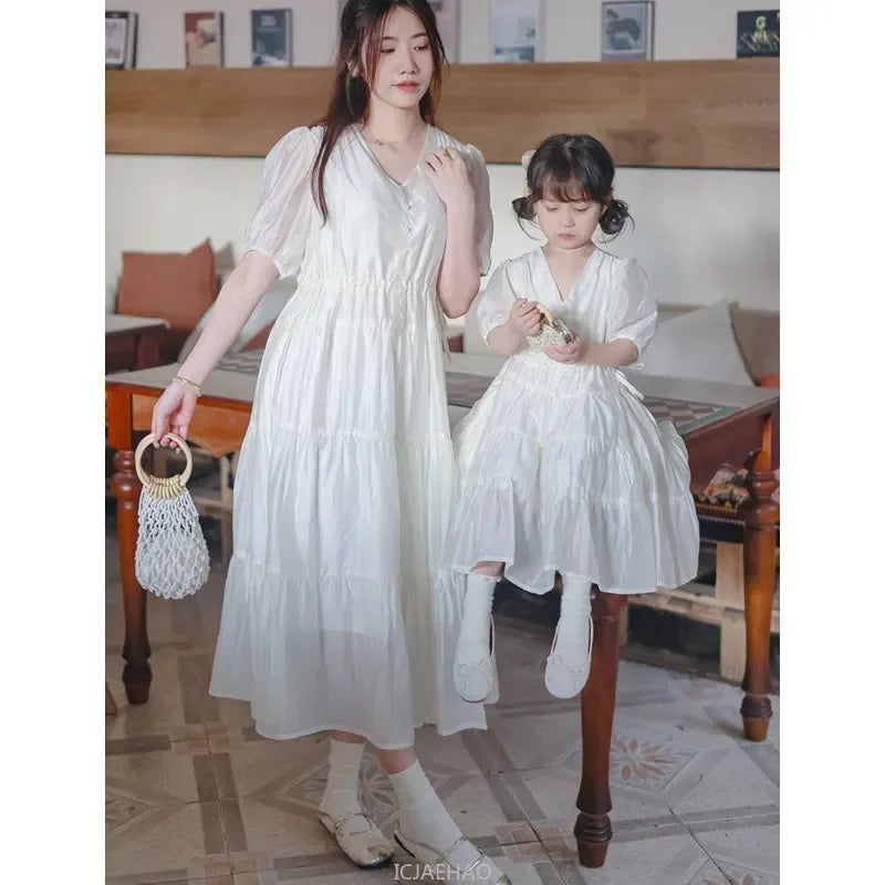 Worlds of Love Elegant Dress — A Graceful Memory in White & Green for Mom & Baby Girl