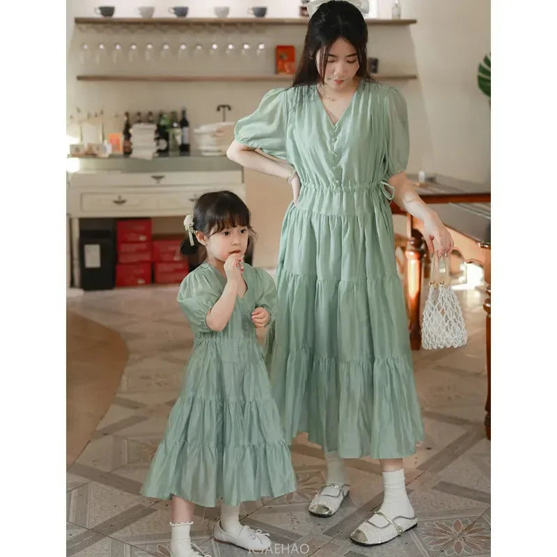 Worlds of Love Elegant Dress — A Graceful Memory in White & Green for Mom & Baby Girl