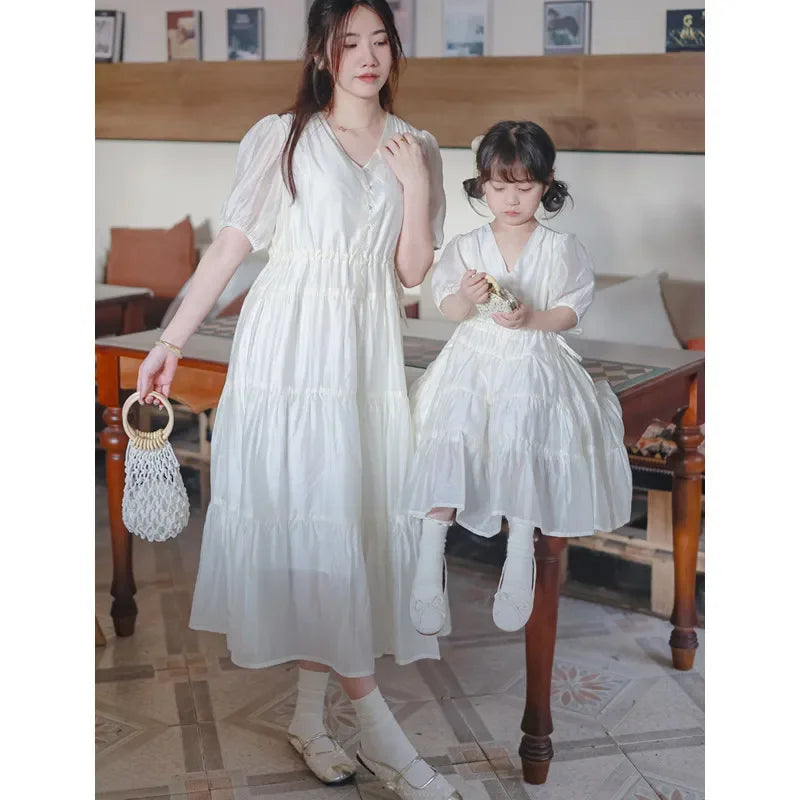 Worlds of Love Elegant Dress — A Graceful Memory in White & Green for Mom & Baby Girl