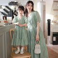 Worlds of Love Elegant Dress — A Graceful Memory in White & Green for Mom & Baby Girl