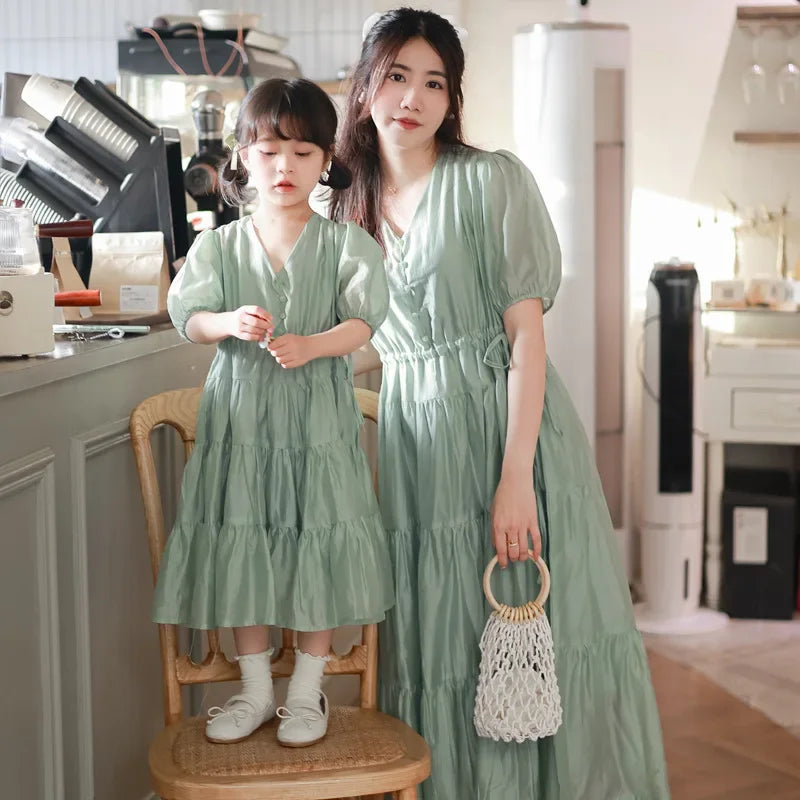 Worlds of Love Elegant Dress — A Graceful Memory in White & Green for Mom & Baby Girl