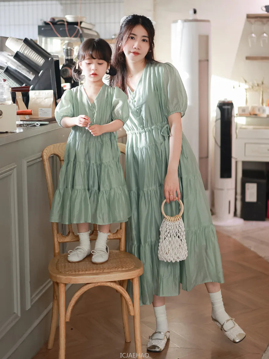 Worlds of Love Elegant Dress — A Graceful Memory in White & Green for Mom & Baby Girl